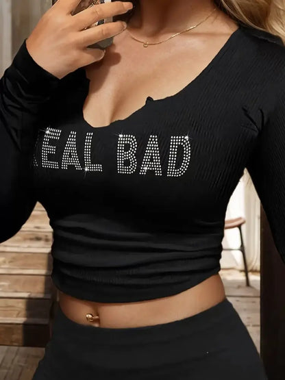 Top "Real Bad" In Rhinestones